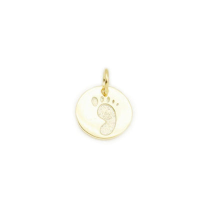 Round gold print charm pendant with bail loop and toe details, isolated