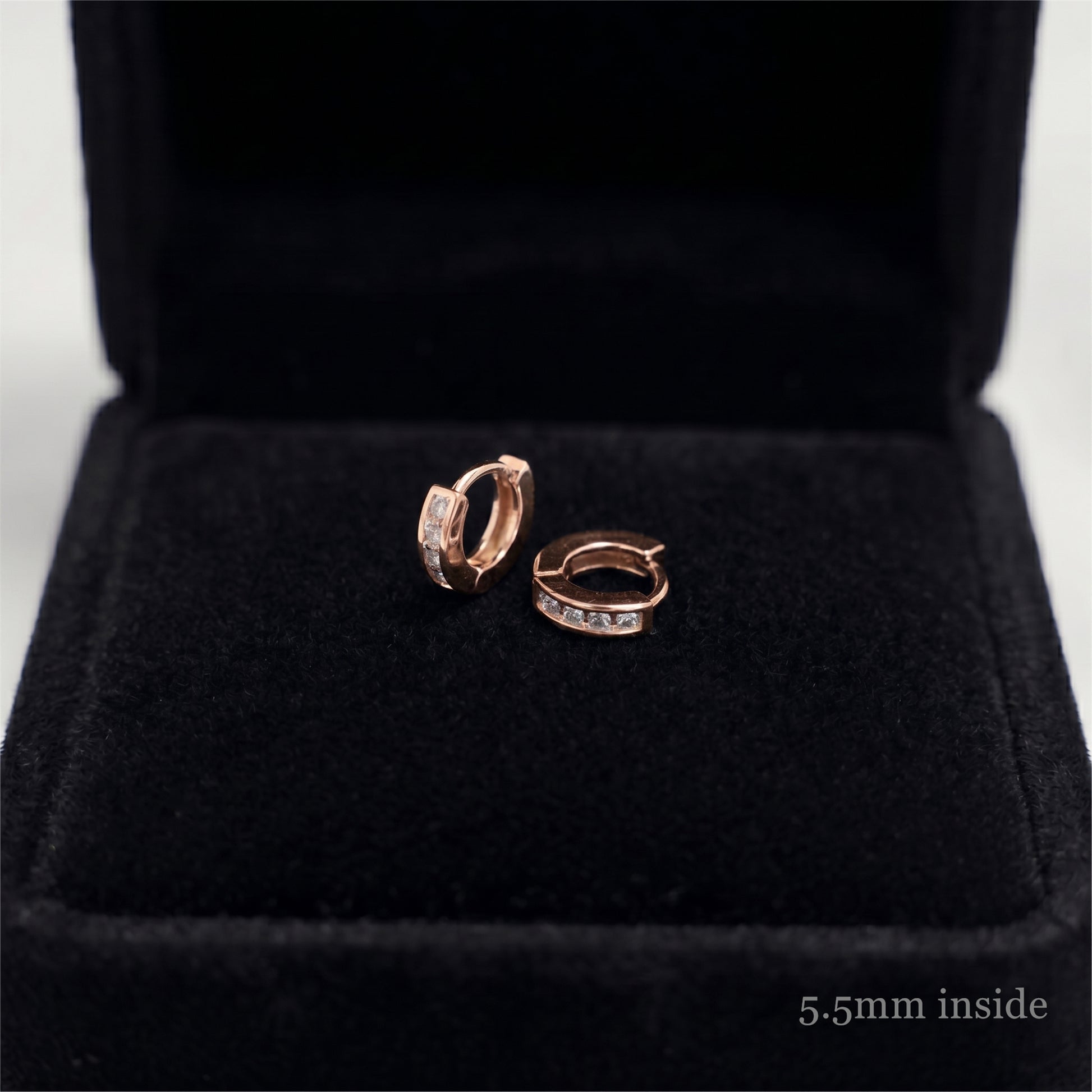 Rose Gold Channel Huggie Hoops inner view with clear stone row