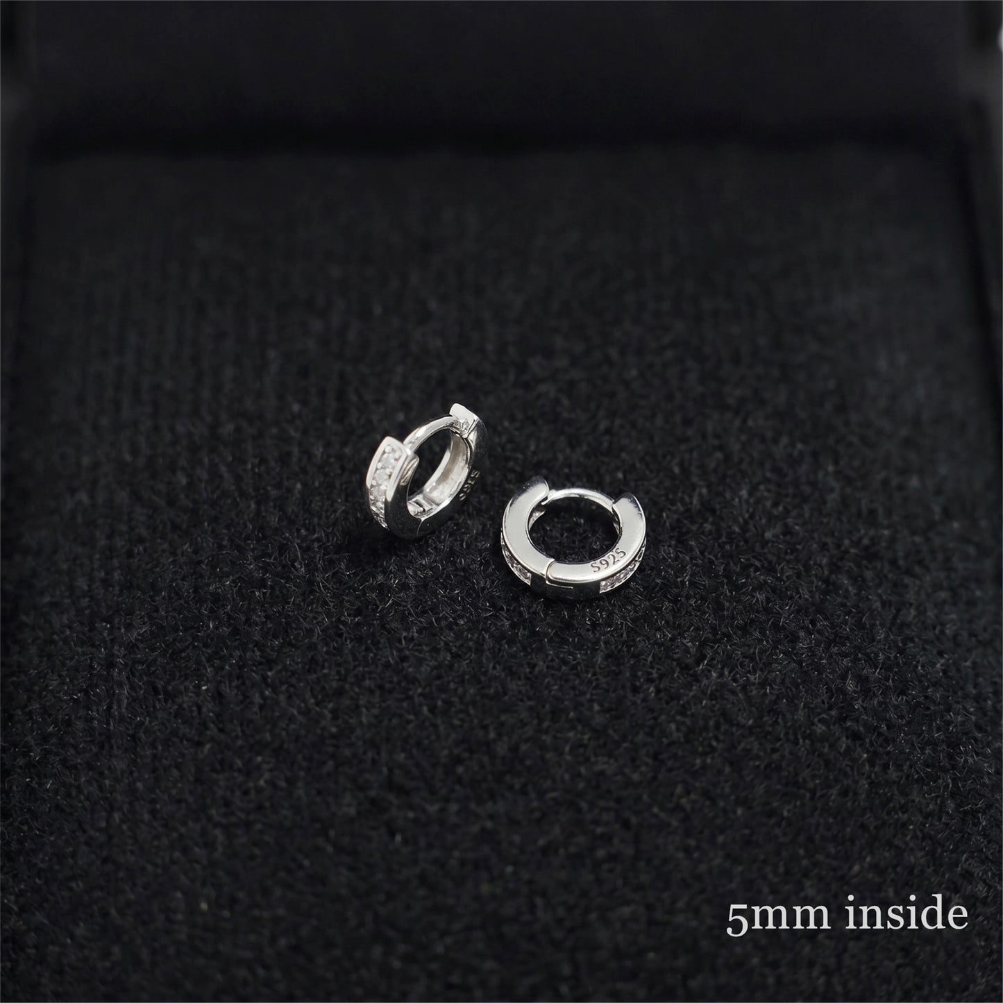 Rhodium Channel Huggie Hoops inner view: oval hoop with clear stone row