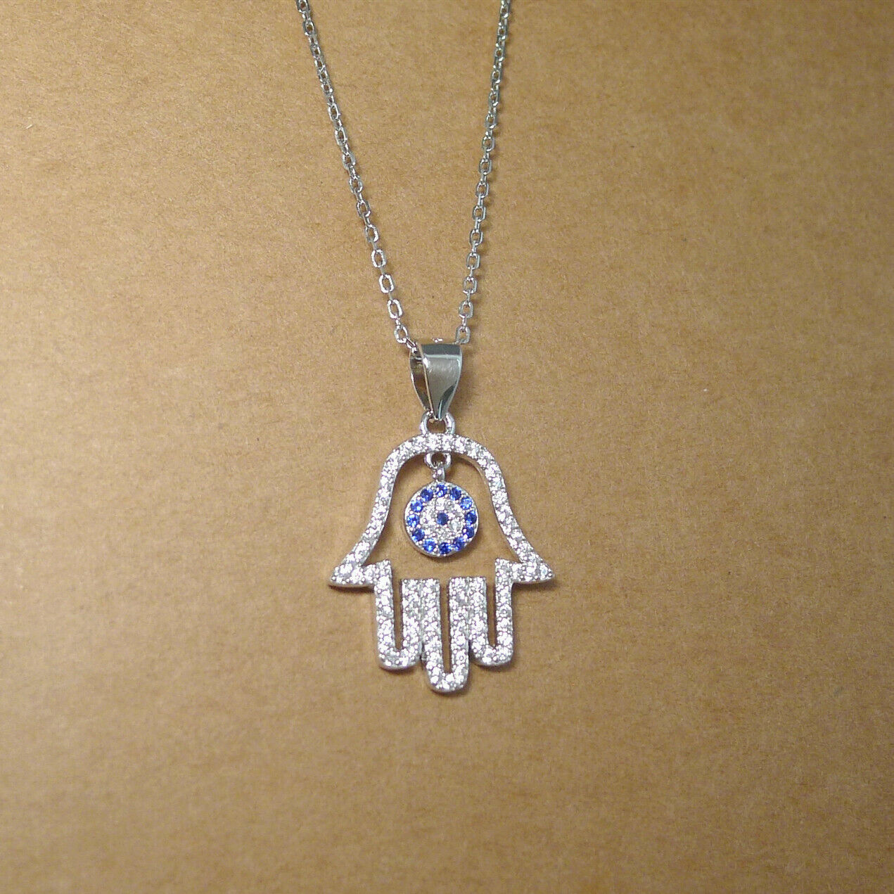 Sterling Silver Blue Paved CZ Evil Eye Hamsa Hand of Fatima Pendant Necklace - sugarkittenlondon