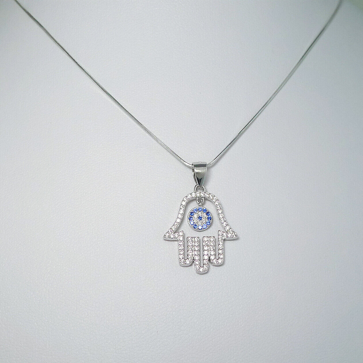 Sterling Silver Blue Paved CZ Evil Eye Hamsa Hand of Fatima Pendant Necklace - sugarkittenlondon