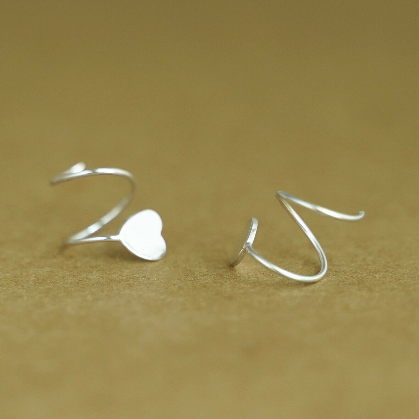 Sterling Silver Heart Twirl Huggie Earrings with Reverse Worn Wire - sugarkittenlondon