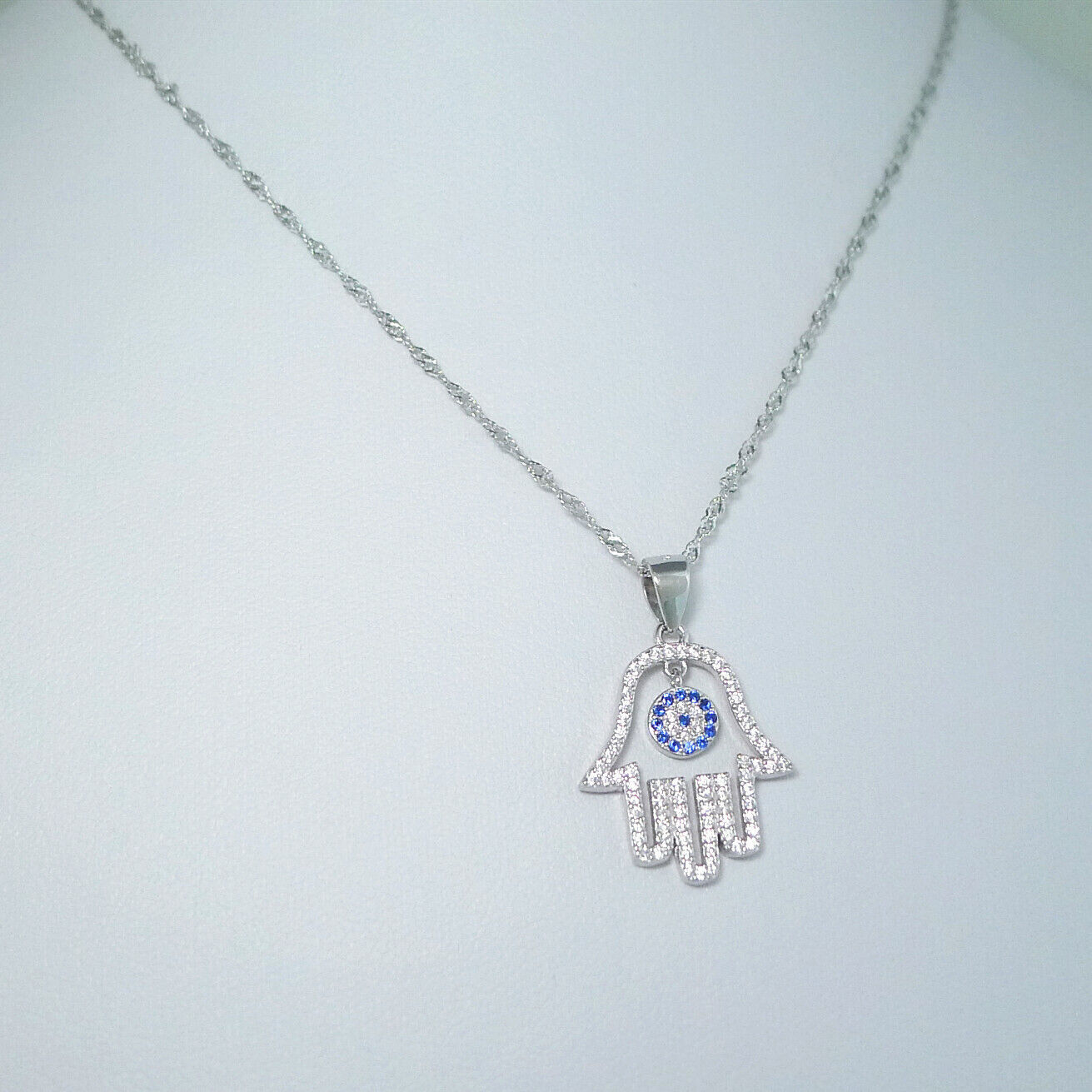 Sterling Silver Blue Paved CZ Evil Eye Hamsa Hand of Fatima Pendant Necklace - sugarkittenlondon