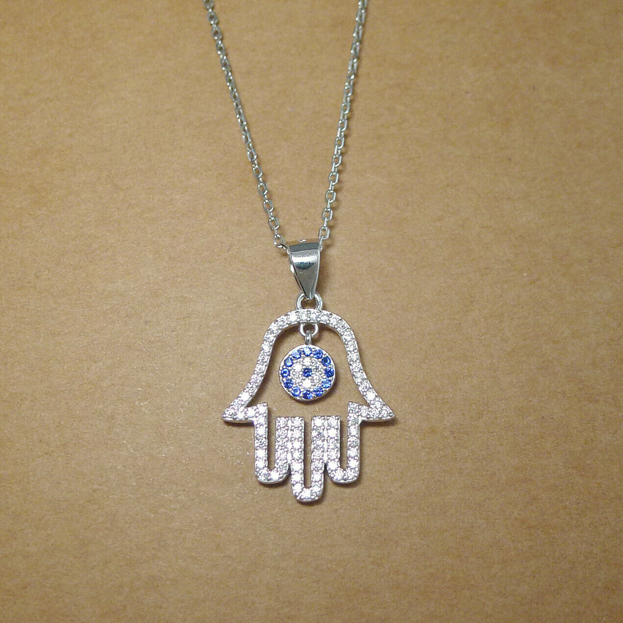 Sterling Silver Blue Paved CZ Evil Eye Hamsa Hand of Fatima Pendant Necklace - sugarkittenlondon