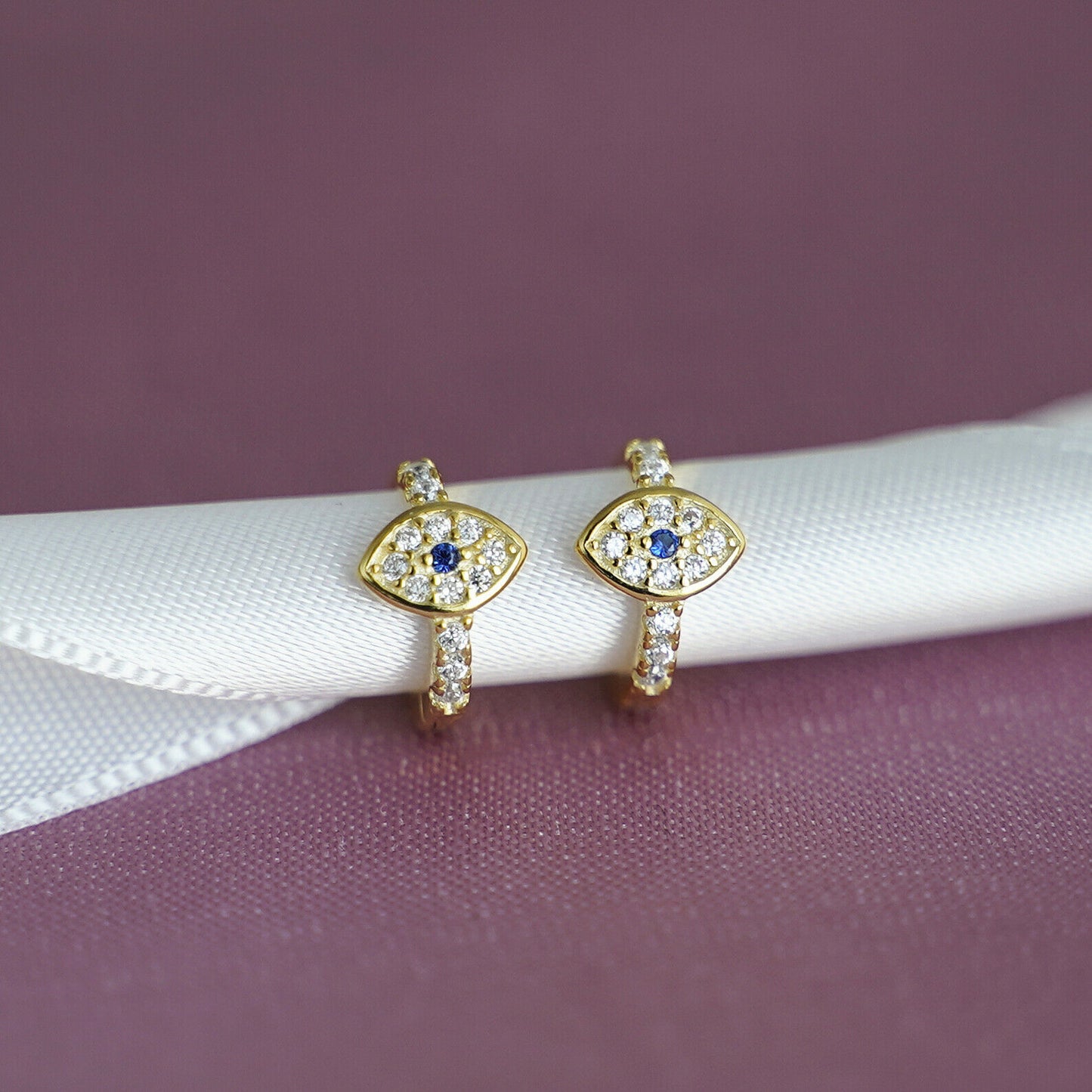 8mm Hoop Earrings with 18K Gold Finish and Blue White CZ Evil Eye Charm - sugarkittenlondon