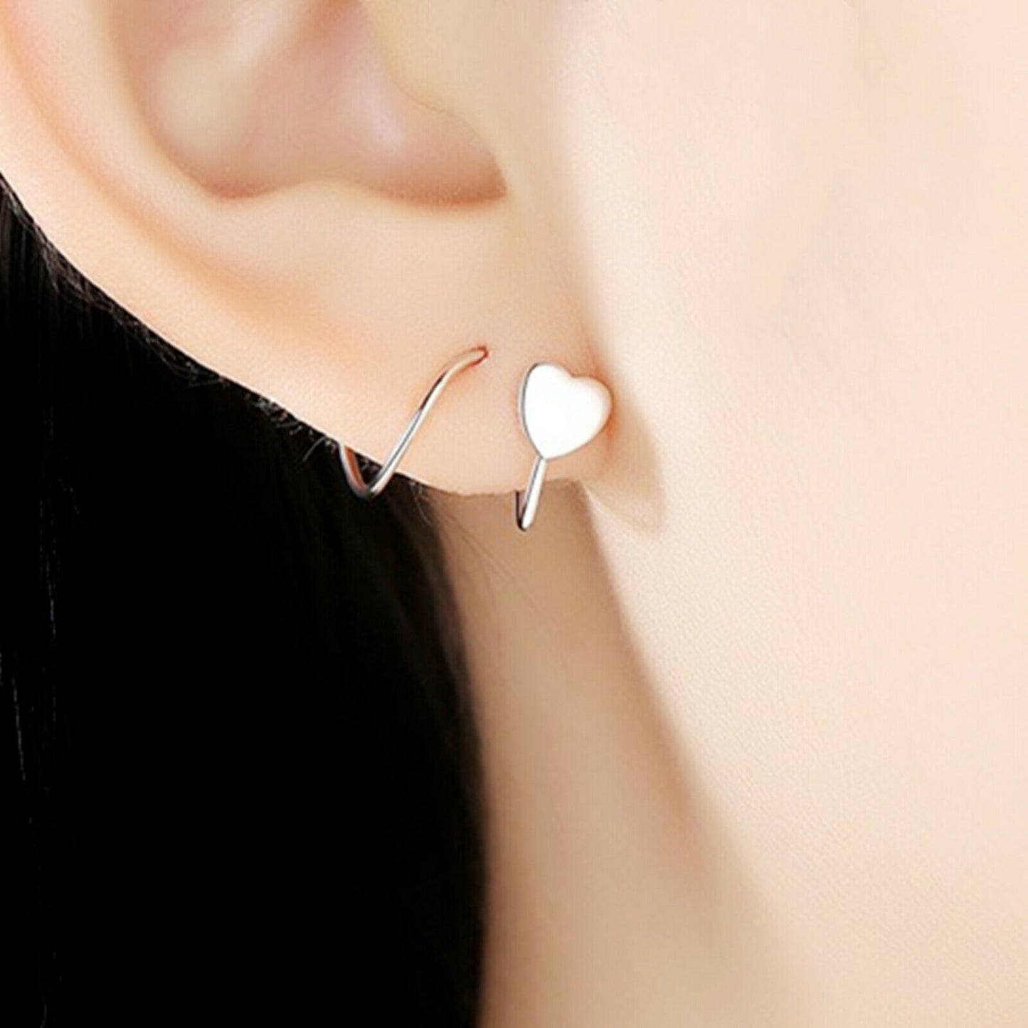 Sterling Silver Heart Twirl Huggie Earrings with Reverse Worn Wire - sugarkittenlondon