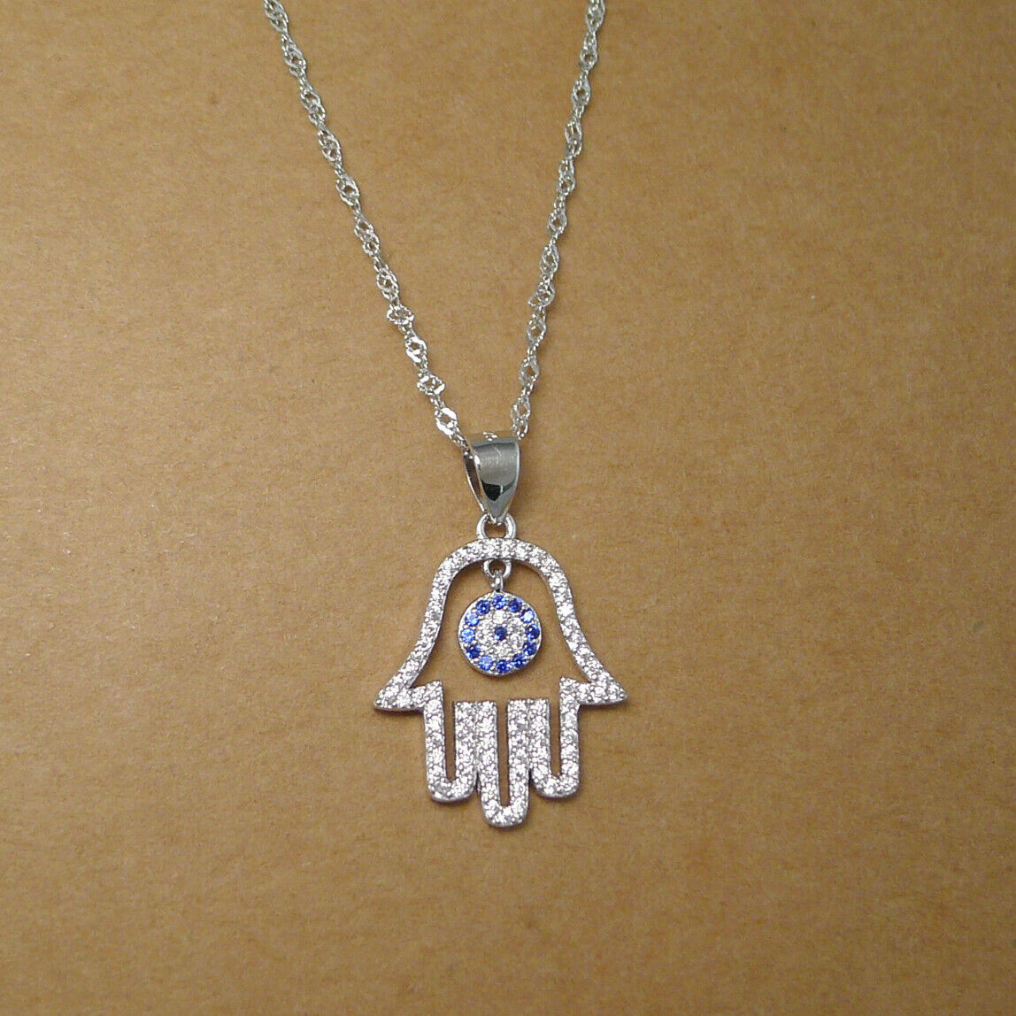 Sterling Silver Blue Paved CZ Evil Eye Hamsa Hand of Fatima Pendant Necklace - sugarkittenlondon