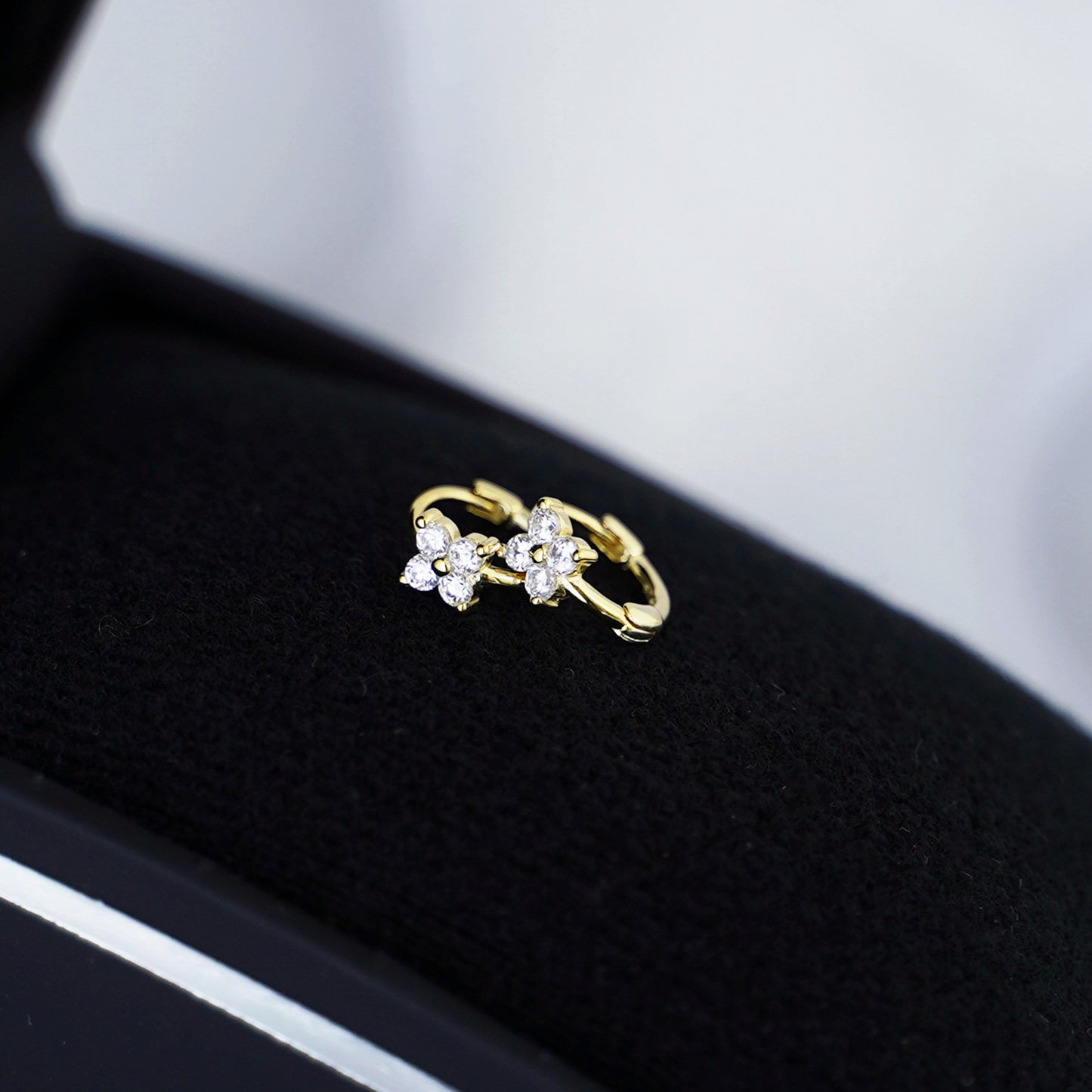 Elegant CZ Flower Huggie Earrings in Sterling Silver with 18K Gold Plating - sugarkittenlondon