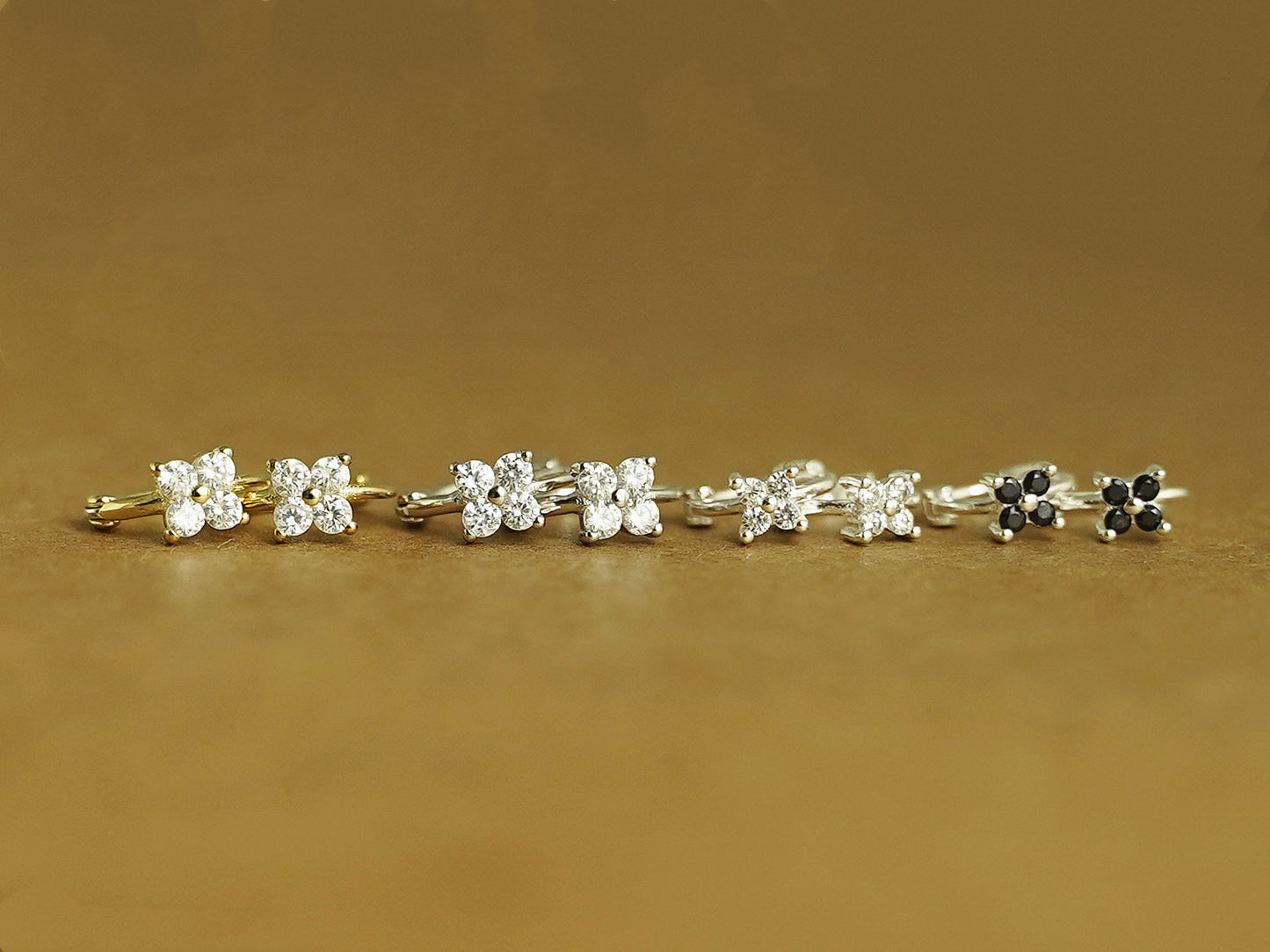 Elegant CZ Flower Huggie Earrings in Sterling Silver with 18K Gold Plating - sugarkittenlondon