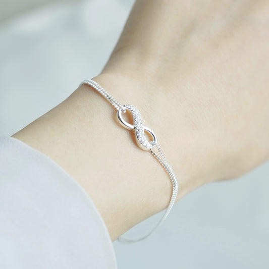 Sterling Silver Infinity Bracelet with Sparkling Crystal CZ - sugarkittenlondon