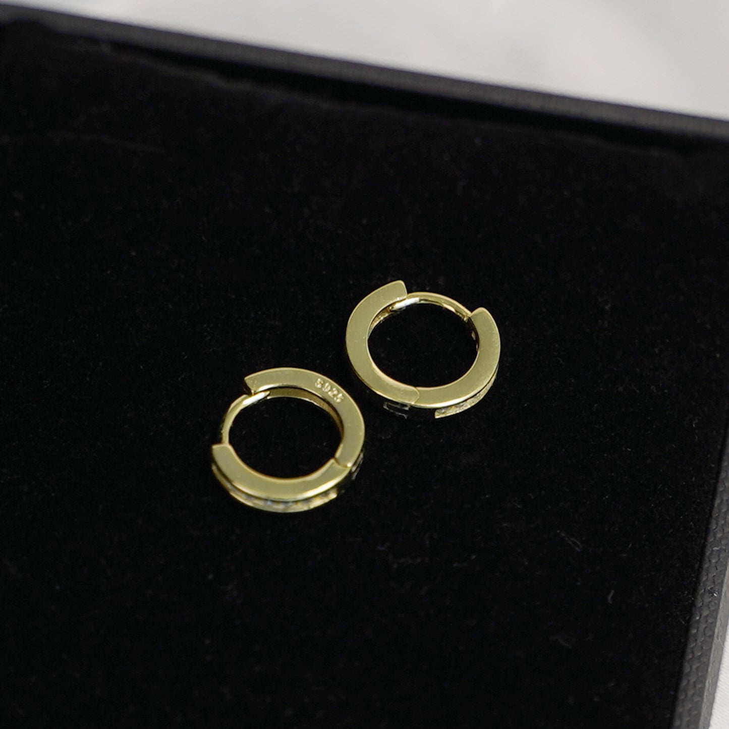 Sterling Silver 9mm Huggie Hoop Eternity Earrings with 18K Gold Plating and Channel-Set CZs - sugarkittenlondon